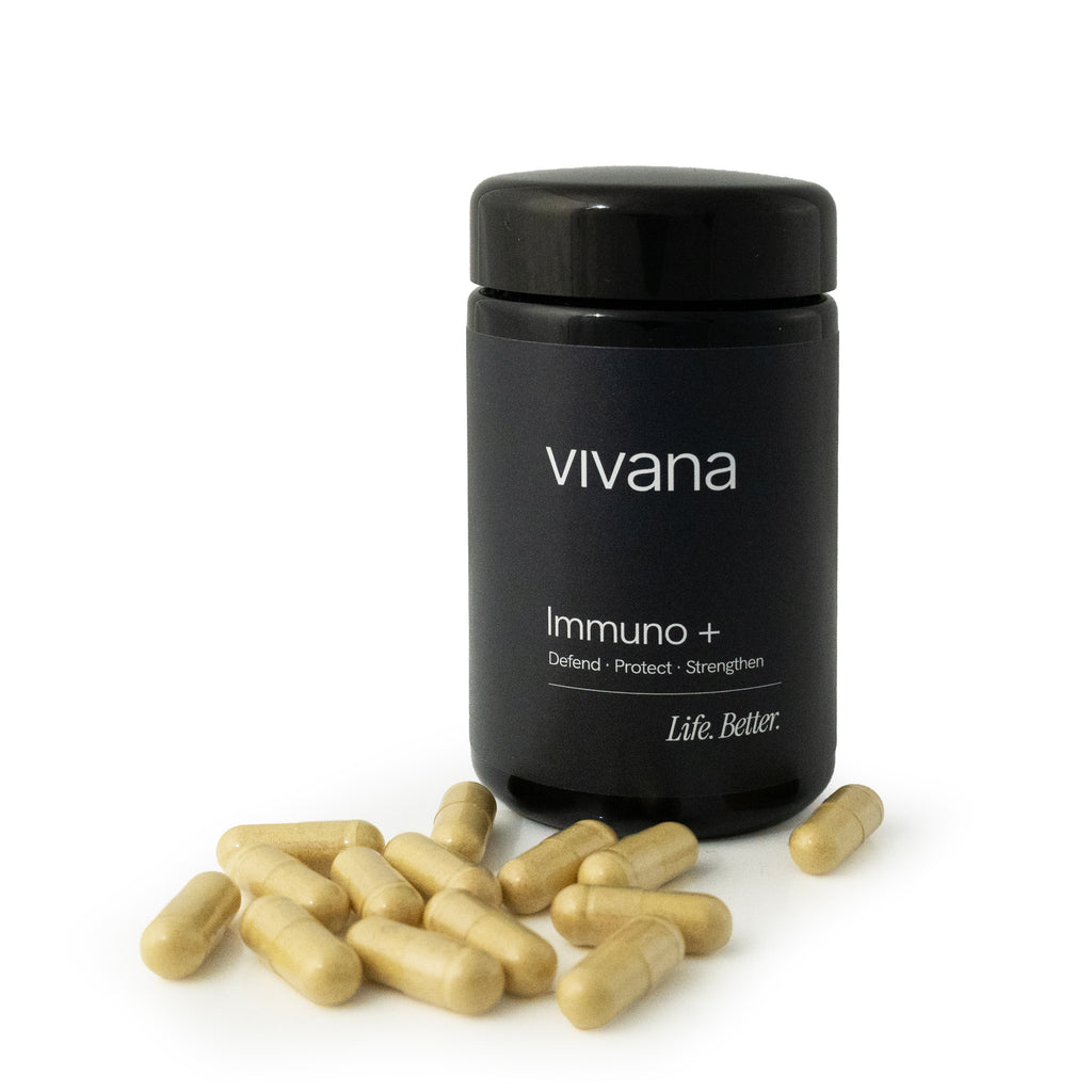 Black bottle of Vivana Immuno+ supplement with capsules on a white background. Life. Better. Vivana 